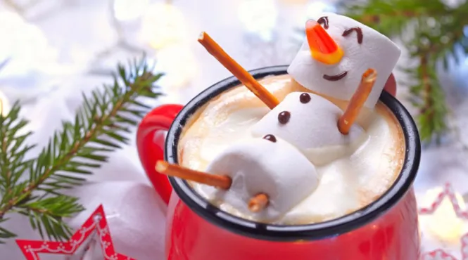 Red mug with hot chocolate and a melted marshmallow snowman