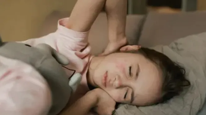 sick girl with the measles