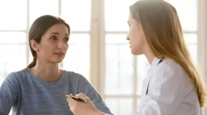 sick patient discussing treatment options with doctor