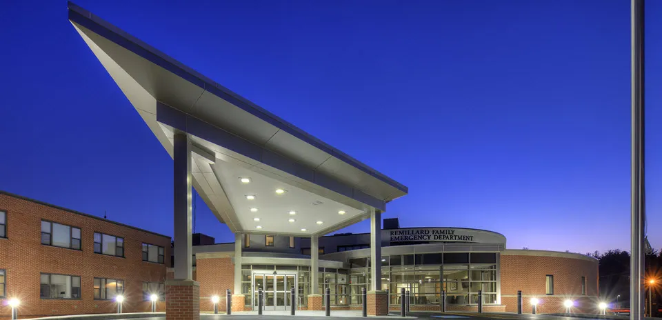 The entrance to the Harrington Hospital Webster Campus Emergency Department entrance, at night. 