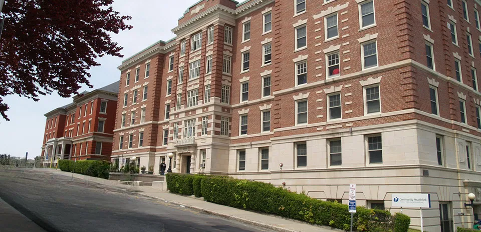 The red brick exterior of Community Healthlink at 12 Queen Street in Worcester. 