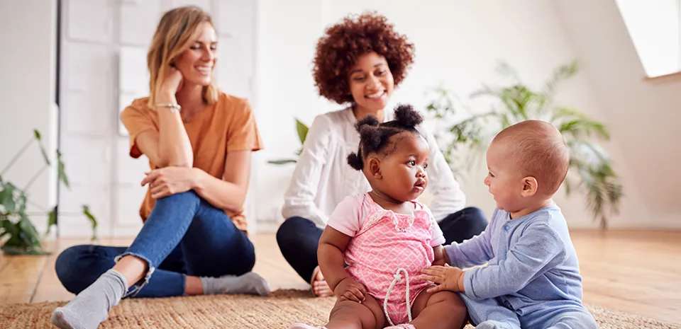 moms having a play date with babies