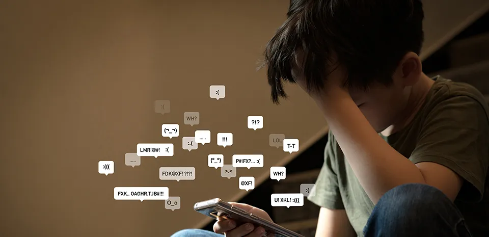 boy being cyberbullied online