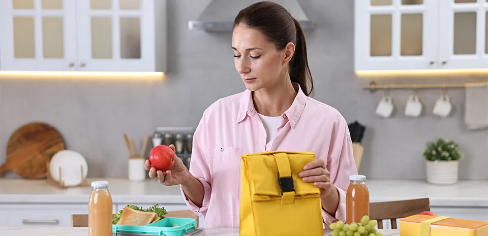 mom preparing lunch for child