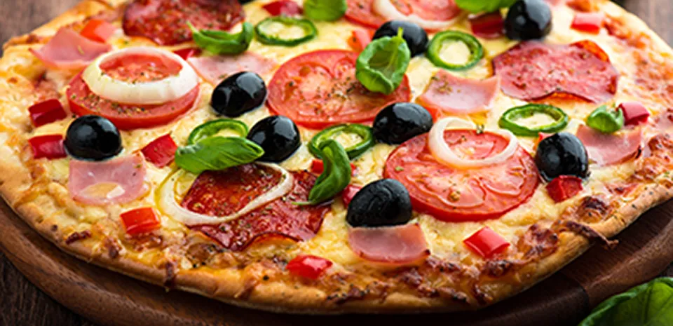 pizza with peppers olives and tomatoes