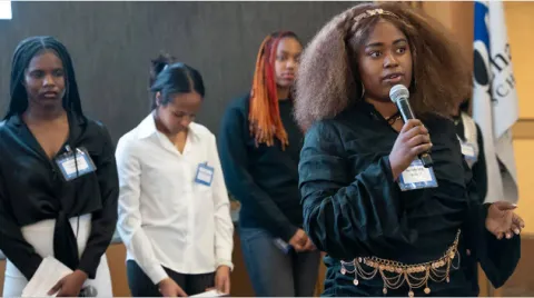 Nakeisha Moise, a junior at North High School, takes a turn presenting her team’s research project at the Pipeline Dreams Research Expo