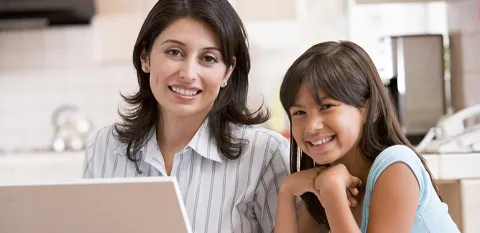 mom and child on laptop