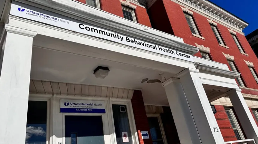 A closeup of the white entryway of Community Healthlink Community Behavioral Health Center at 74 Jaques Avenue in Worcester.