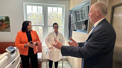 Dr. Eric Dickson, President and CEO of UMass Memorial Health speaks to Kim Driscoll (Lt. Governor) and a physician during a North Pavilion tour.