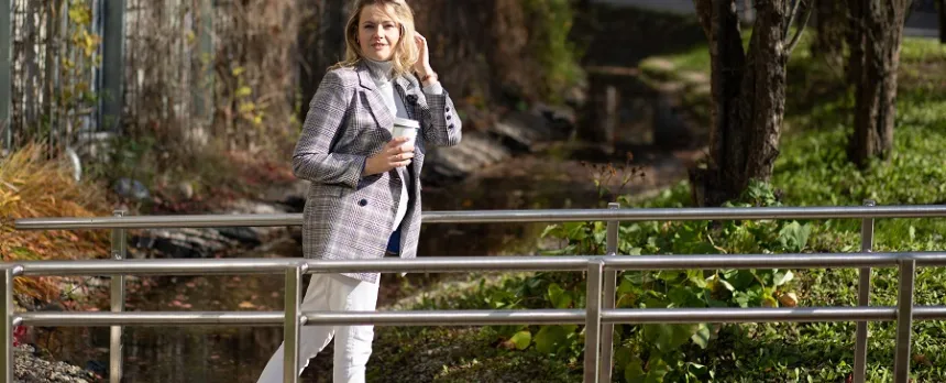 woman mindfully walking in park without stress